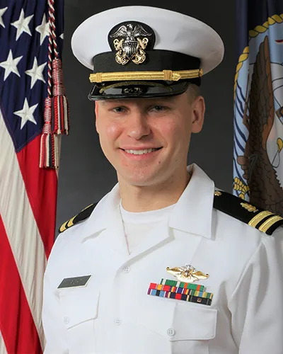 A headshot photo of Dr. Daniel Wright wearing his navy uniform
