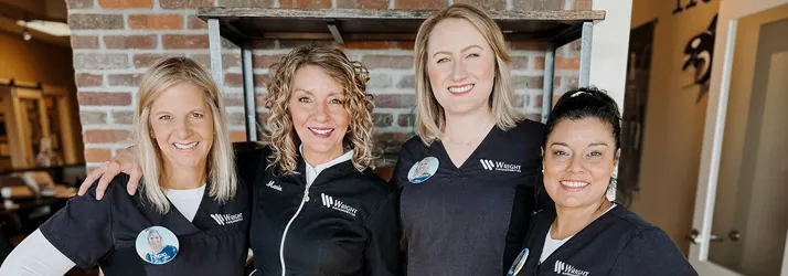 Orthodontist Batavia IL Staff Contact Us The staff at Wright Orthodontics standing together during a professional photoshoot